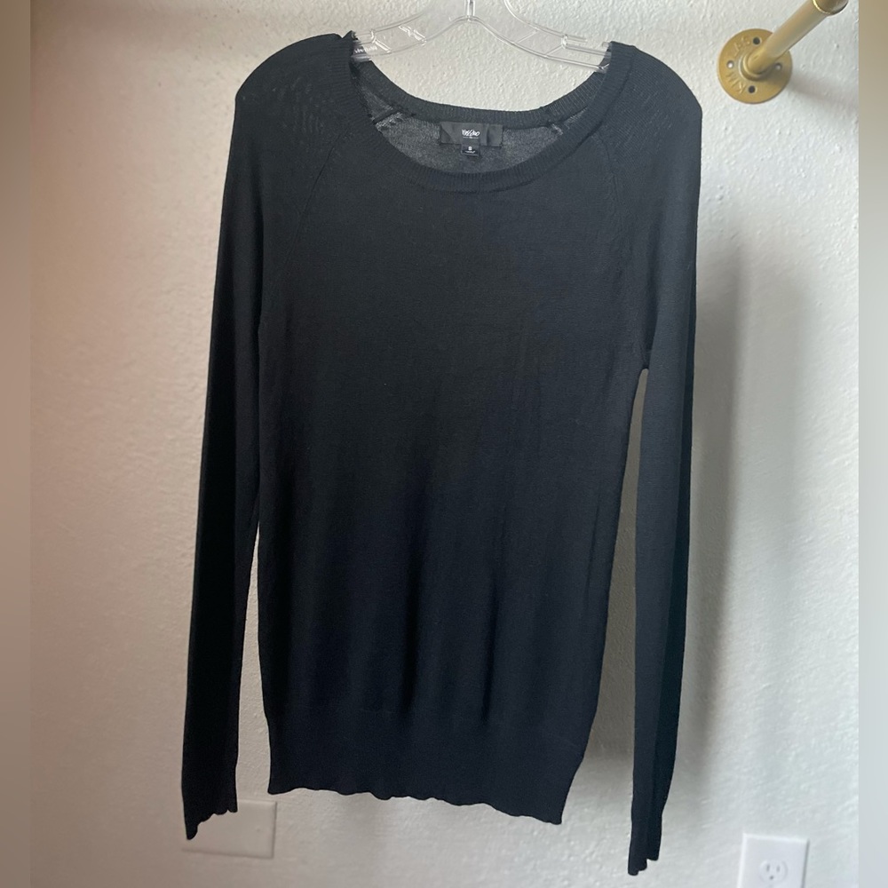 The Black Sweater